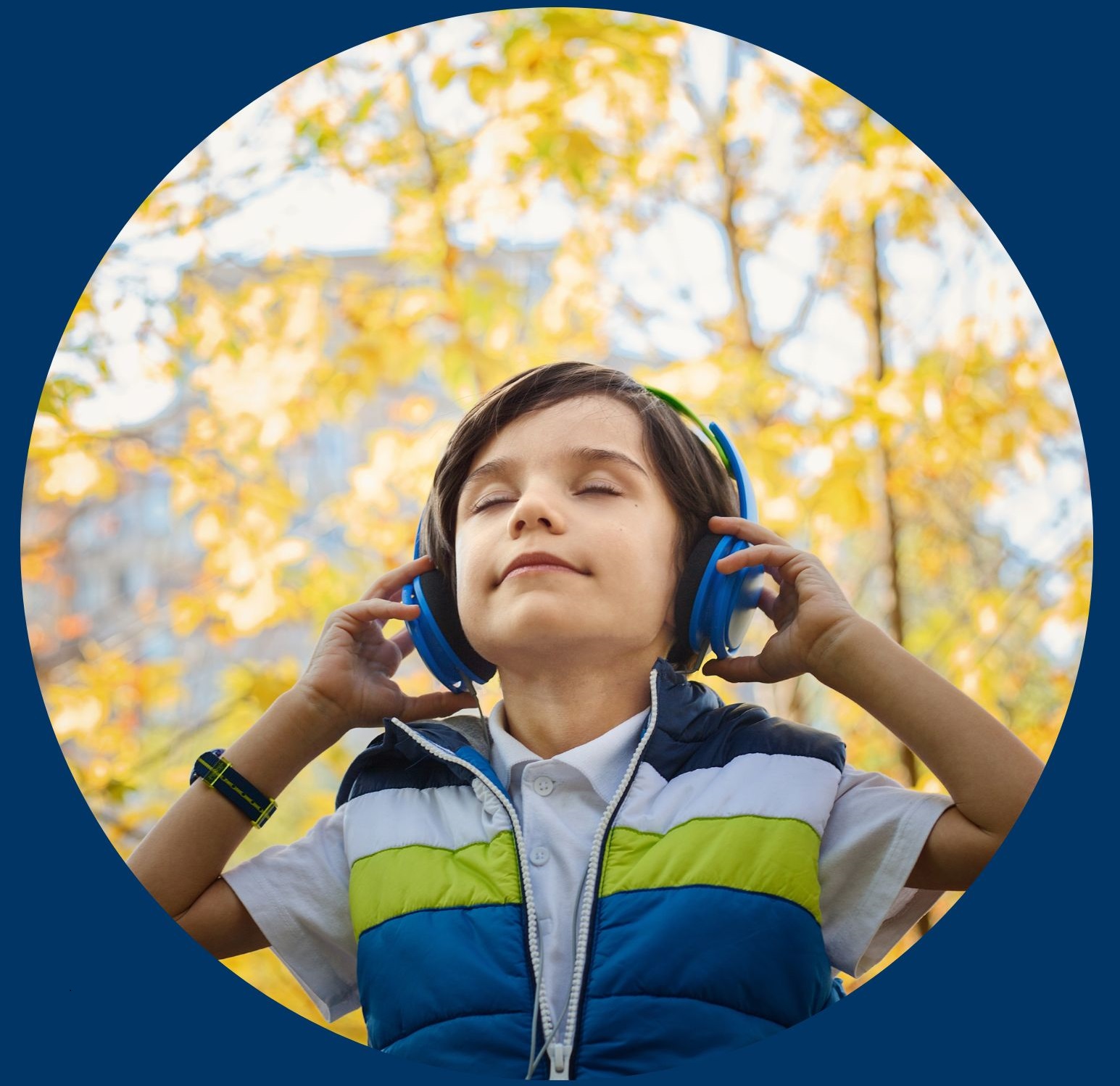 Image of boy listening to headphones with eyes closed