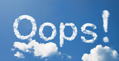 the word "Oops" written in the clouds