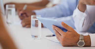 Meeting with table and glasses of water