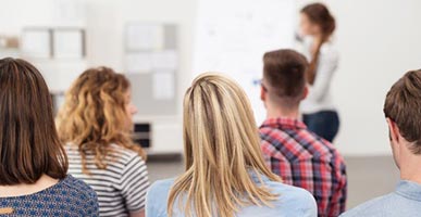 audience listening to a speaker