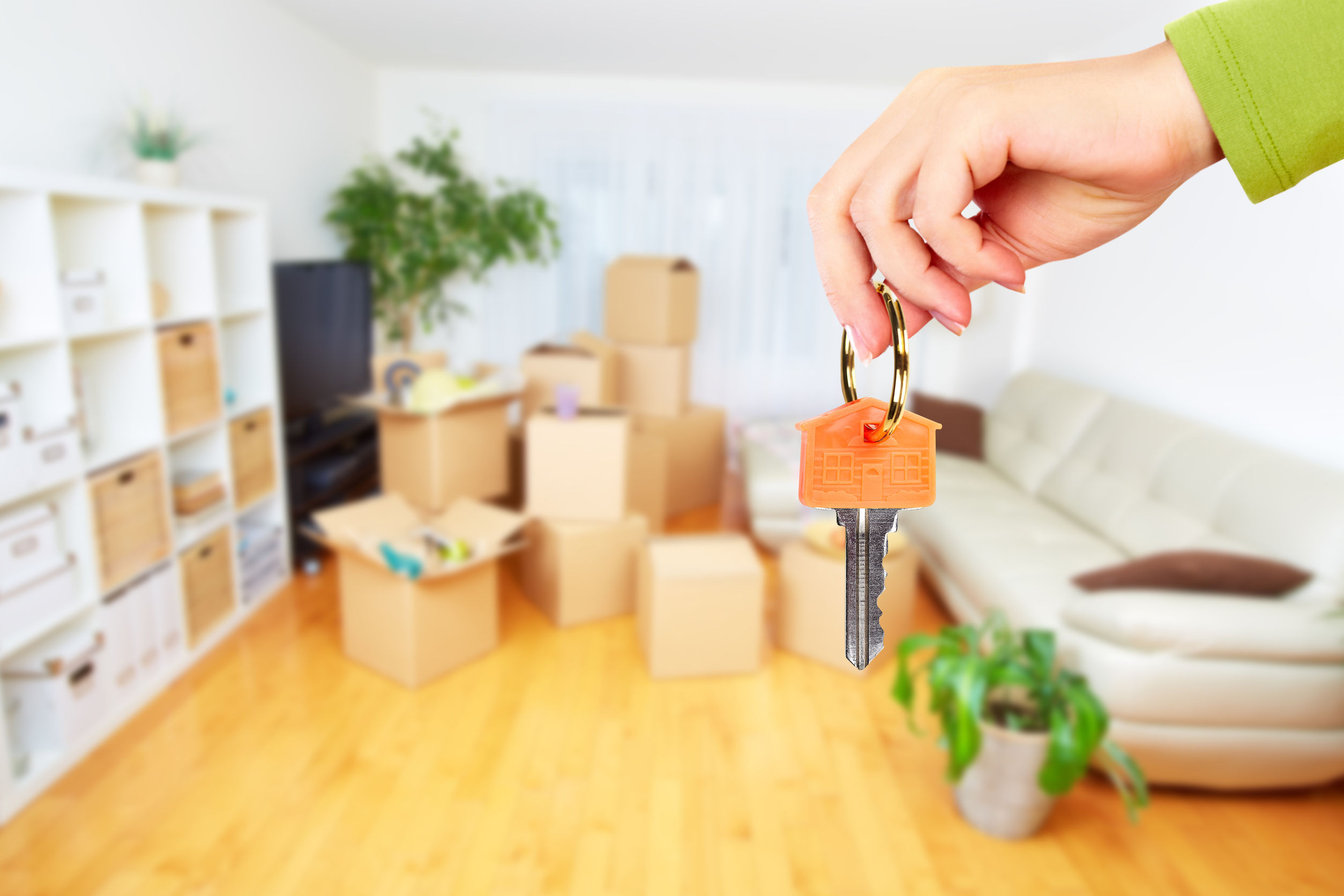 keys in foreground; moving into a house