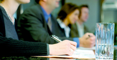 Men and women in a meeting