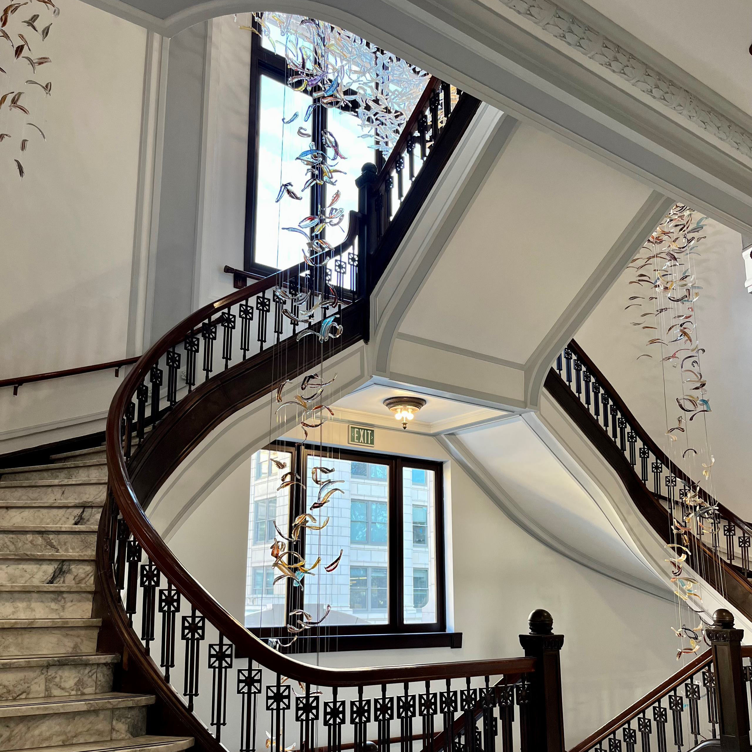 staircase with glass art