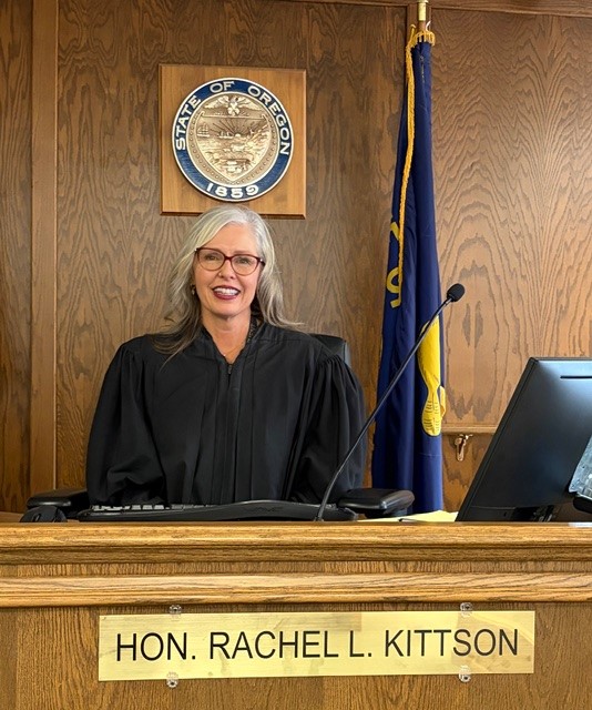 Judge Kittson sitting on bench