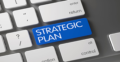 Keyboard with key that says Strategic Plan